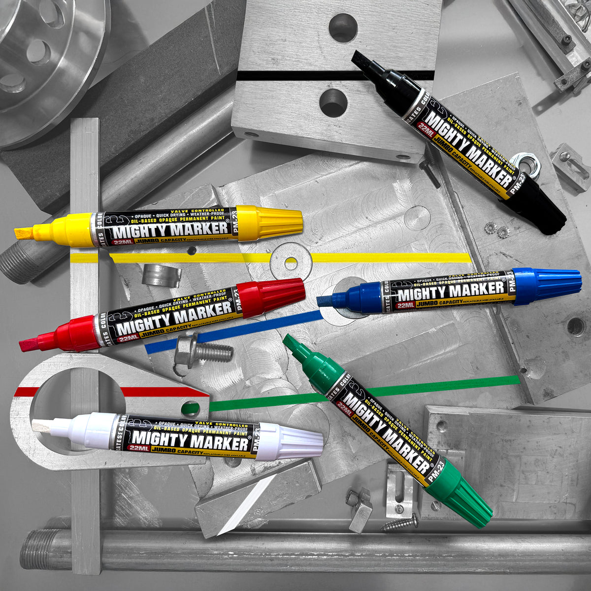 PM-23 Mighty Marker pens in various colors on a metallic surface
