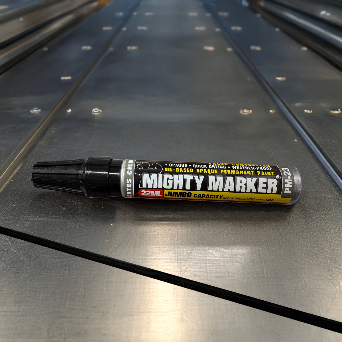 PM-23 Mighty Marker paint pen on a metallic surface